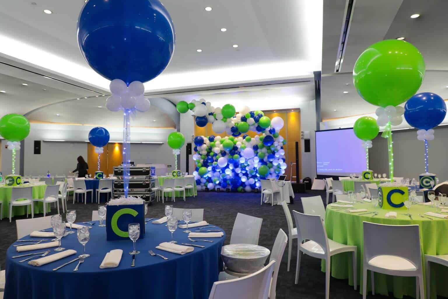Custom Cube Centerpieces with Cutout Initial and Logo for Blue and Lime Themed Bar Mitzvah at Temple Israel, NYC
