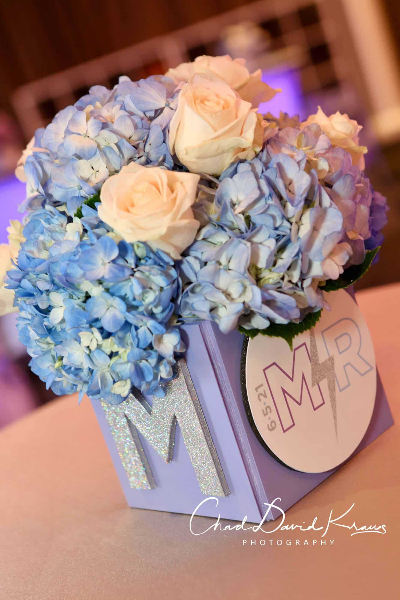 Lavender Mini Logo Cubes Centerpiece with Floral Arrangement