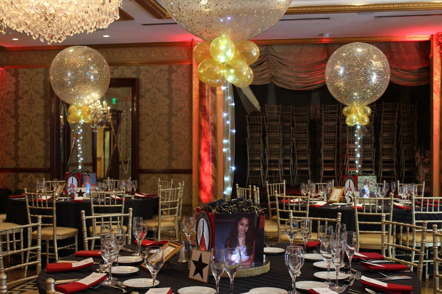 Red Carpet Themed Photo Cube with Gold Sparkle Balloons and Lights