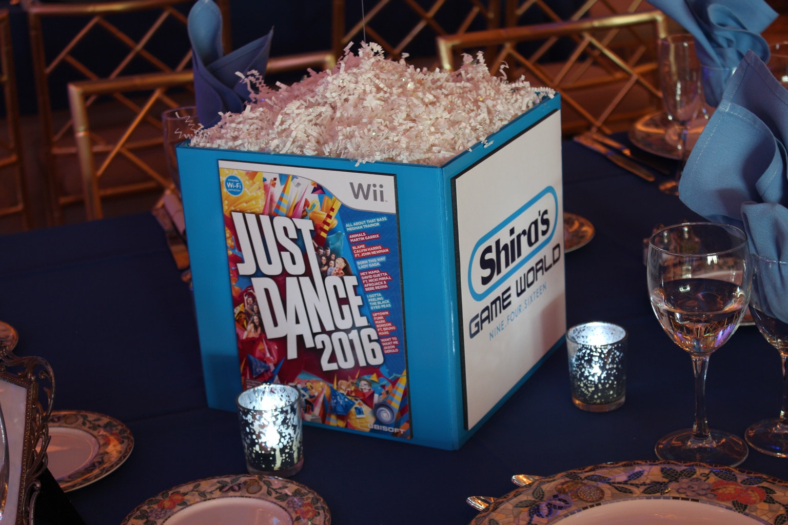 Video Game Themed Cube Centerpiece with Custom Logo and Game Covers