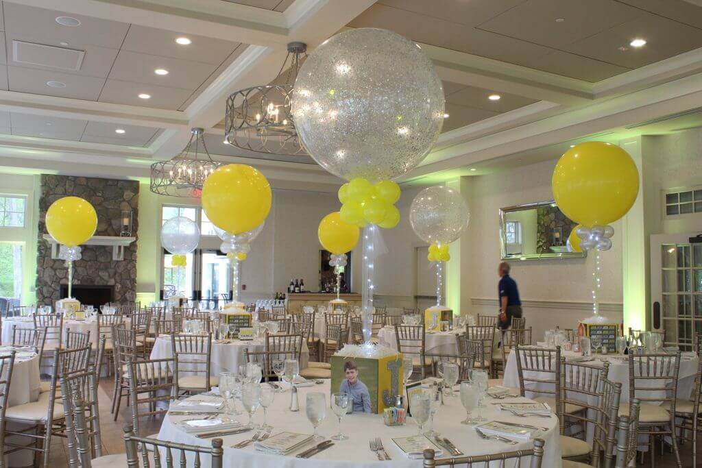 Yellow and Silver Bar Mitzvah with Photo Cube Centerpieces and Alternating Sparkle and Solid Balloons