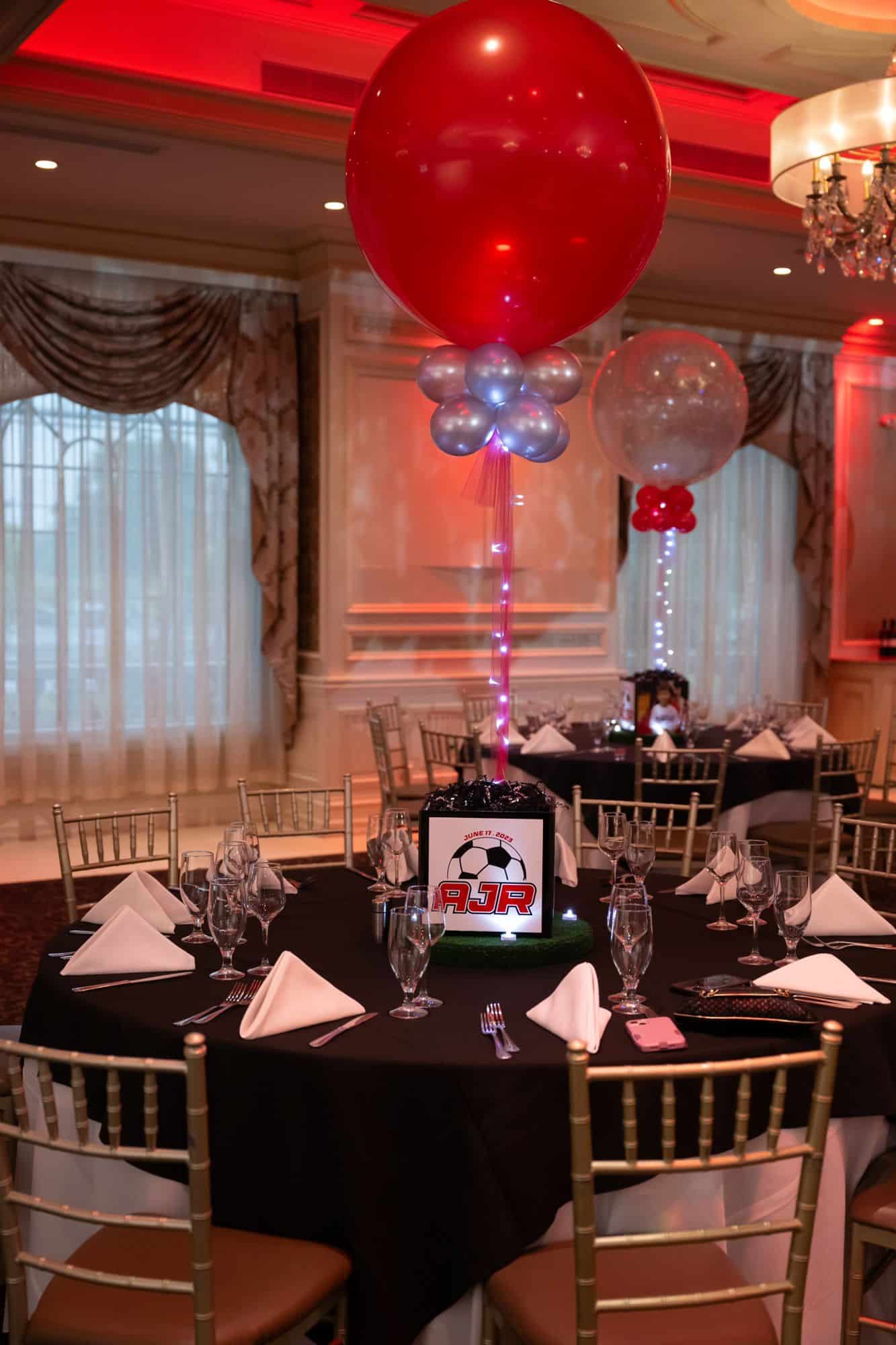 Red and Silver Balloon Centerpiece with Logo Cube Base