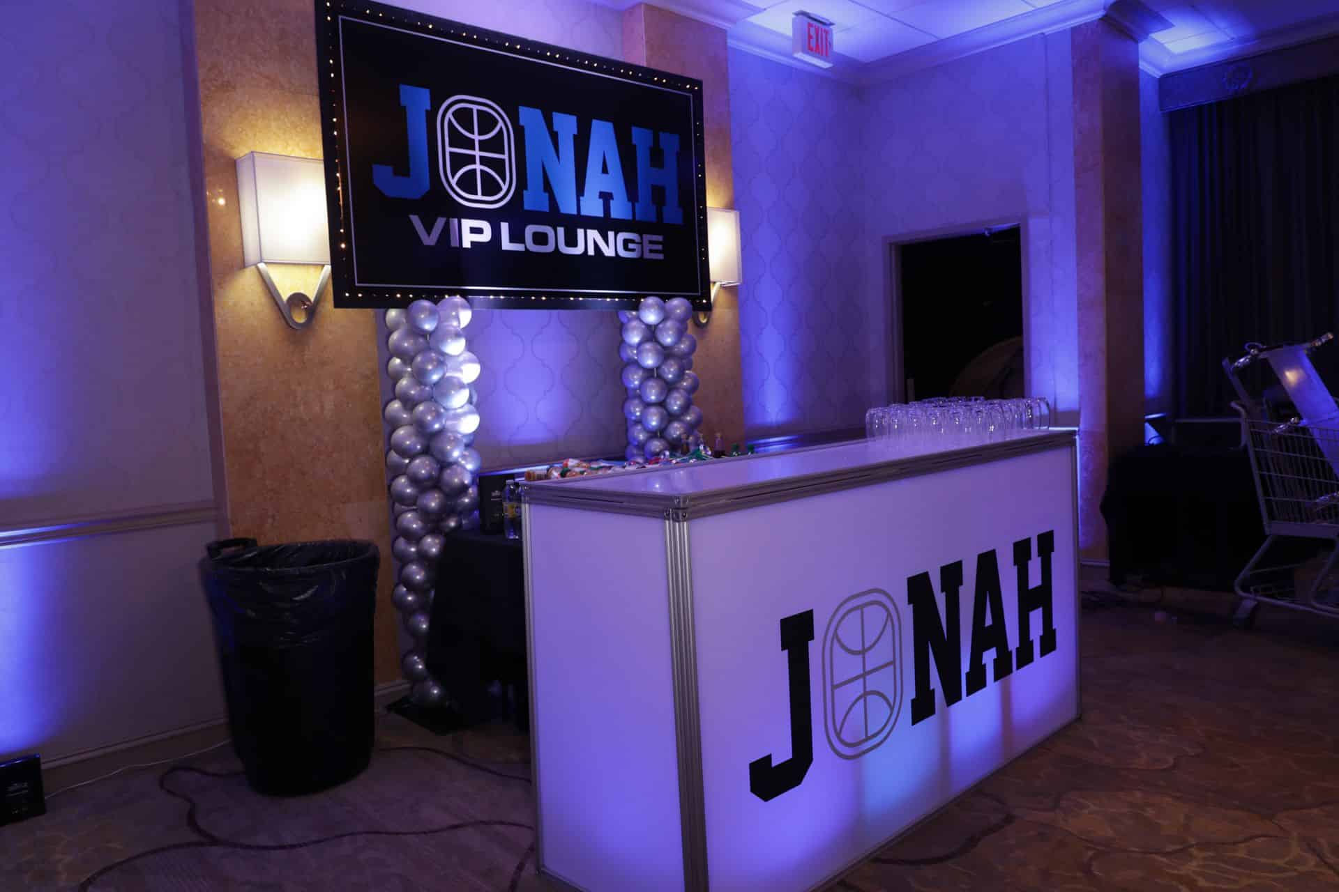 Bar Mitzvah Lounge Sign with Custom Logo Behind LED Bar