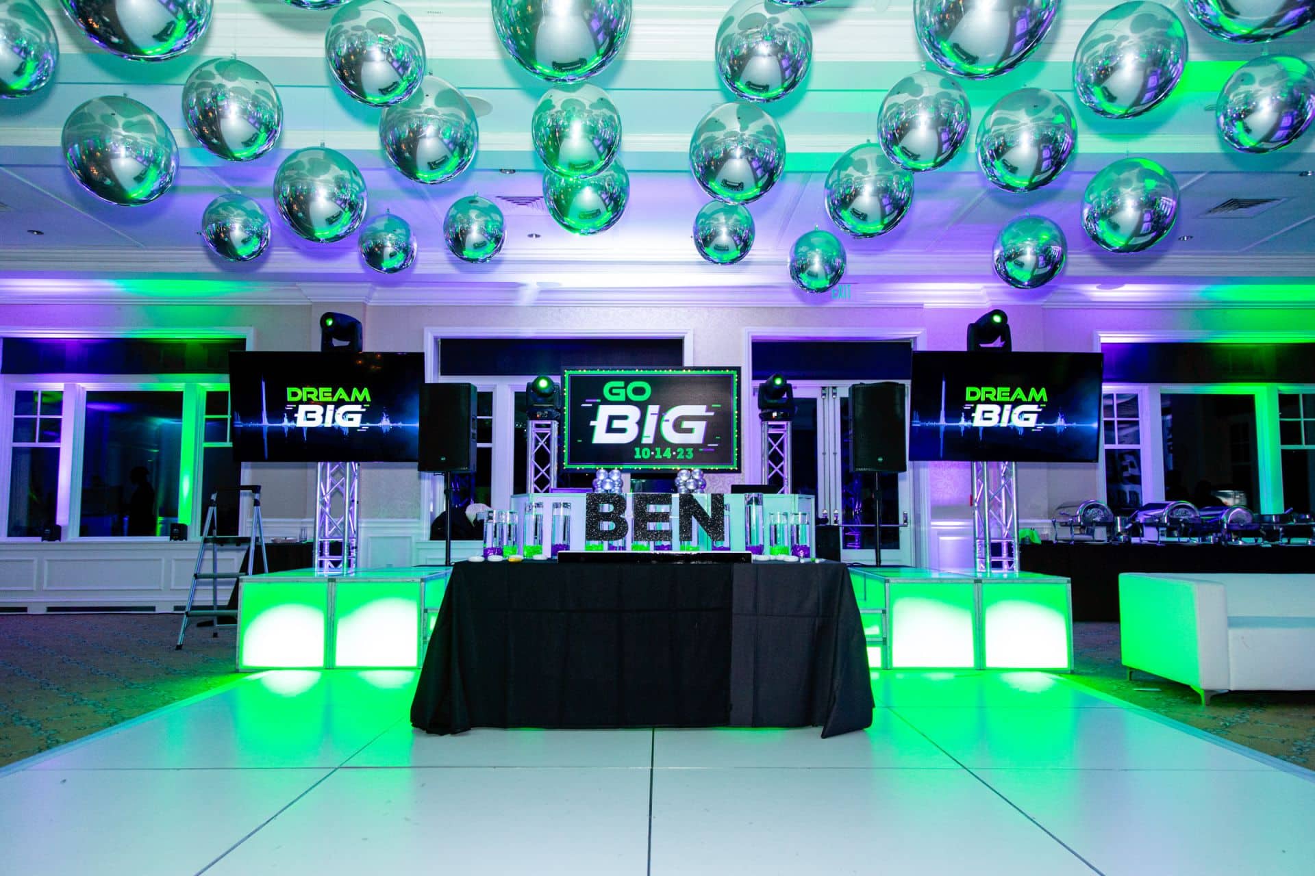 Custom Printed Sign Behind DJ for Neon Themed Bar Mitzvah at Tamarack Country Club