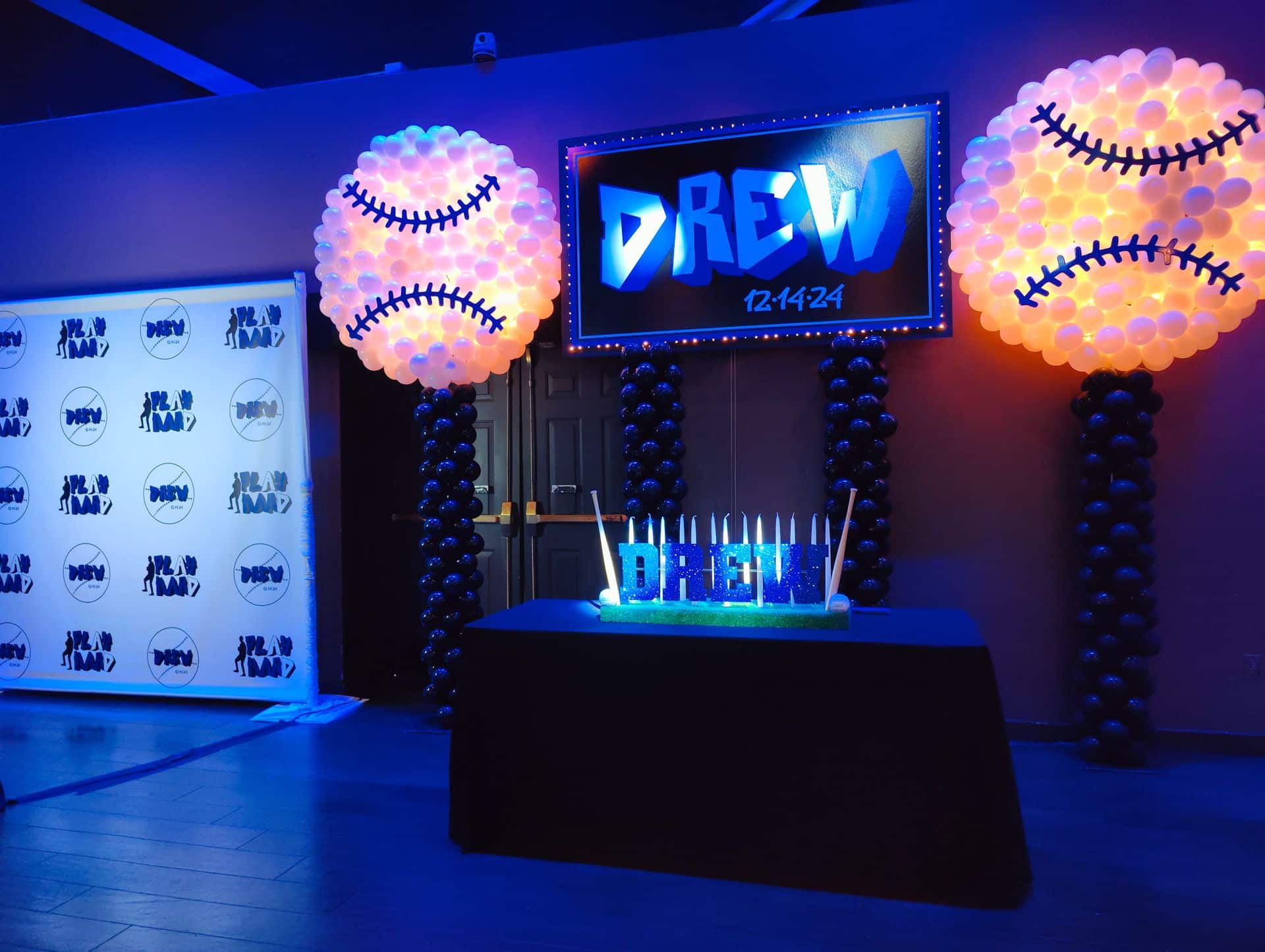 Baseball Themed Printed Sign with Baseball Balloon Sculptures at Vibe