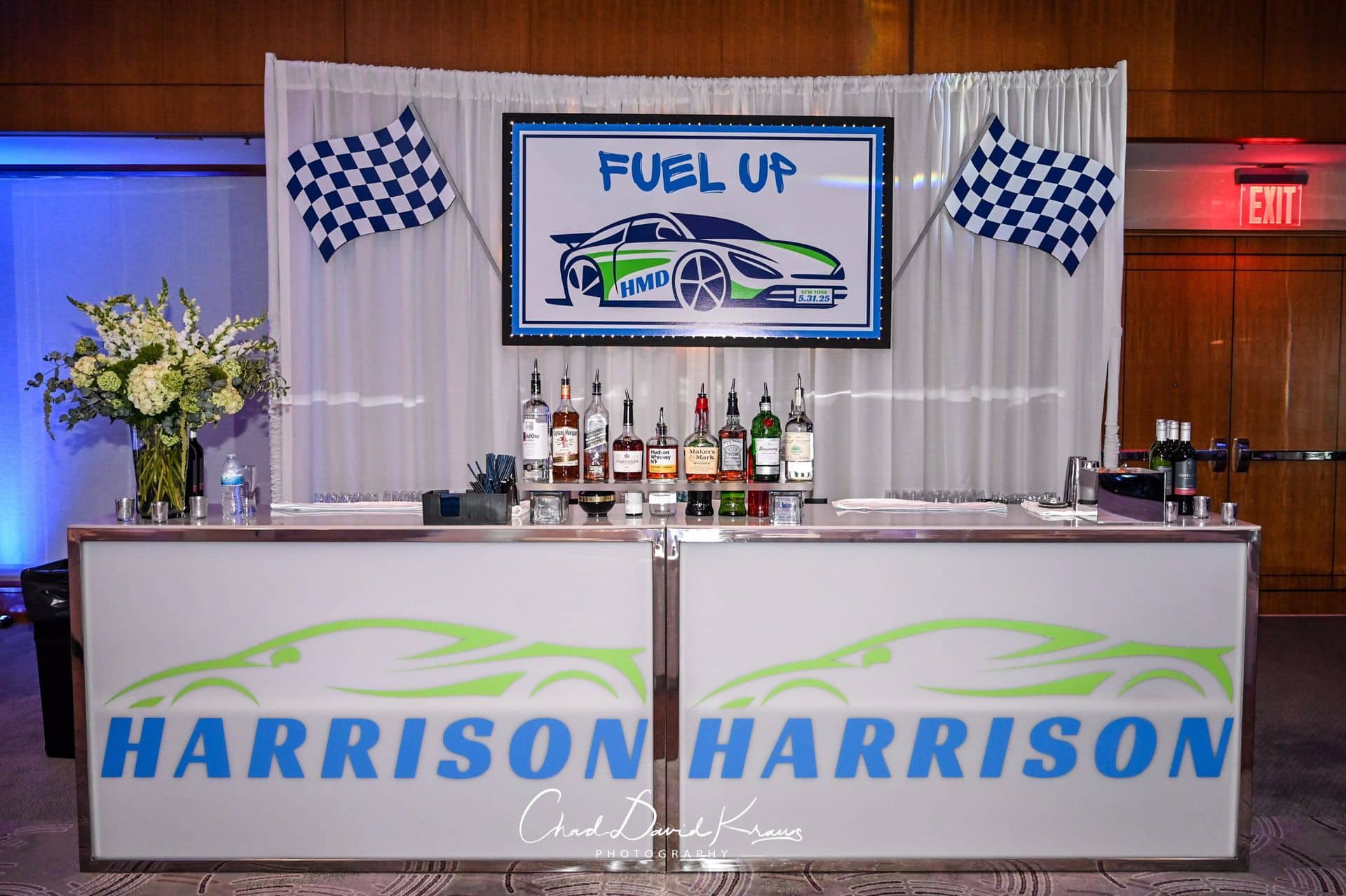 Custom Car Theme Printed Sign with Lights on LED Drape behind Bar