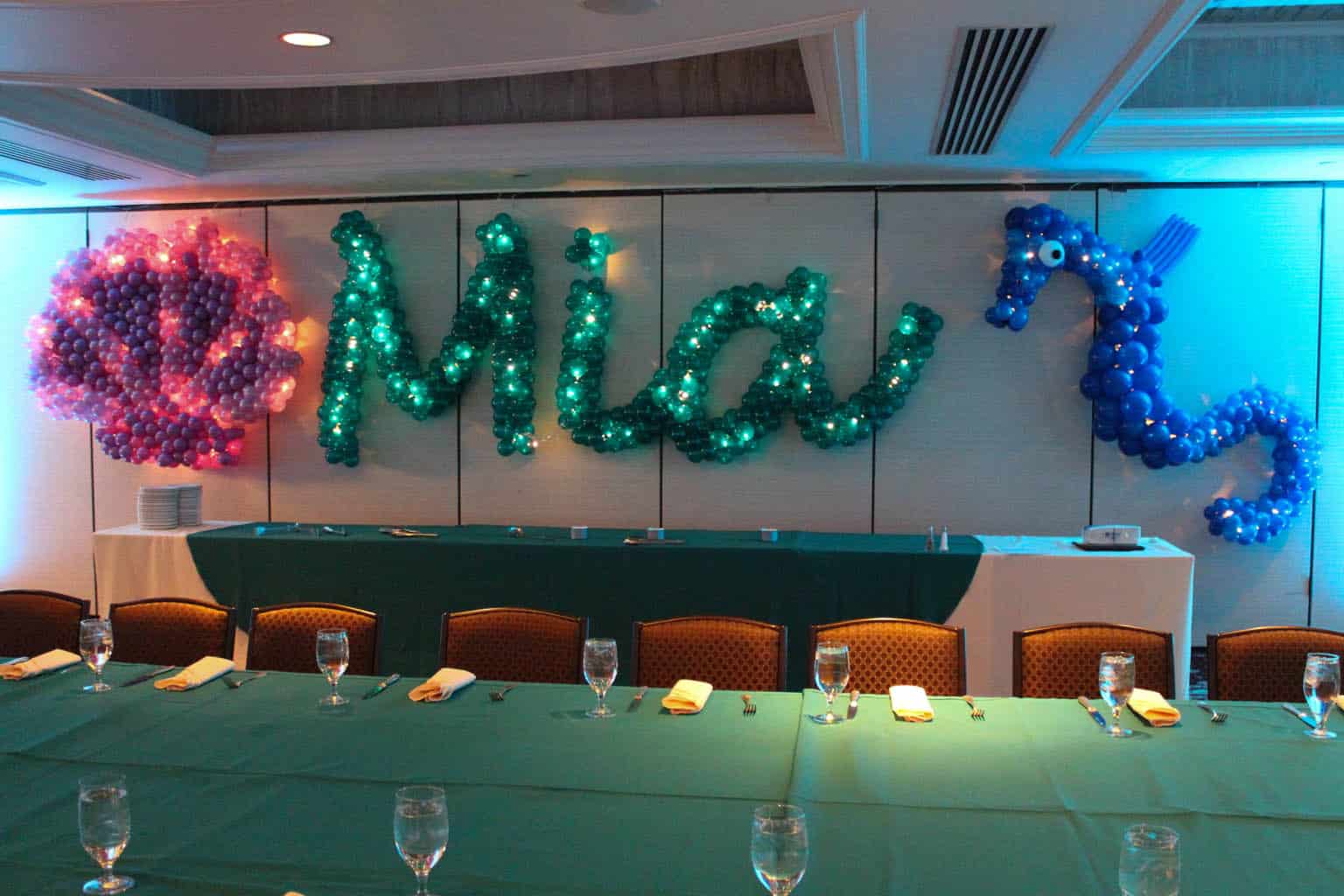 Teal Name in Balloons with Seashell and Sea Horse Balloon Sculpture