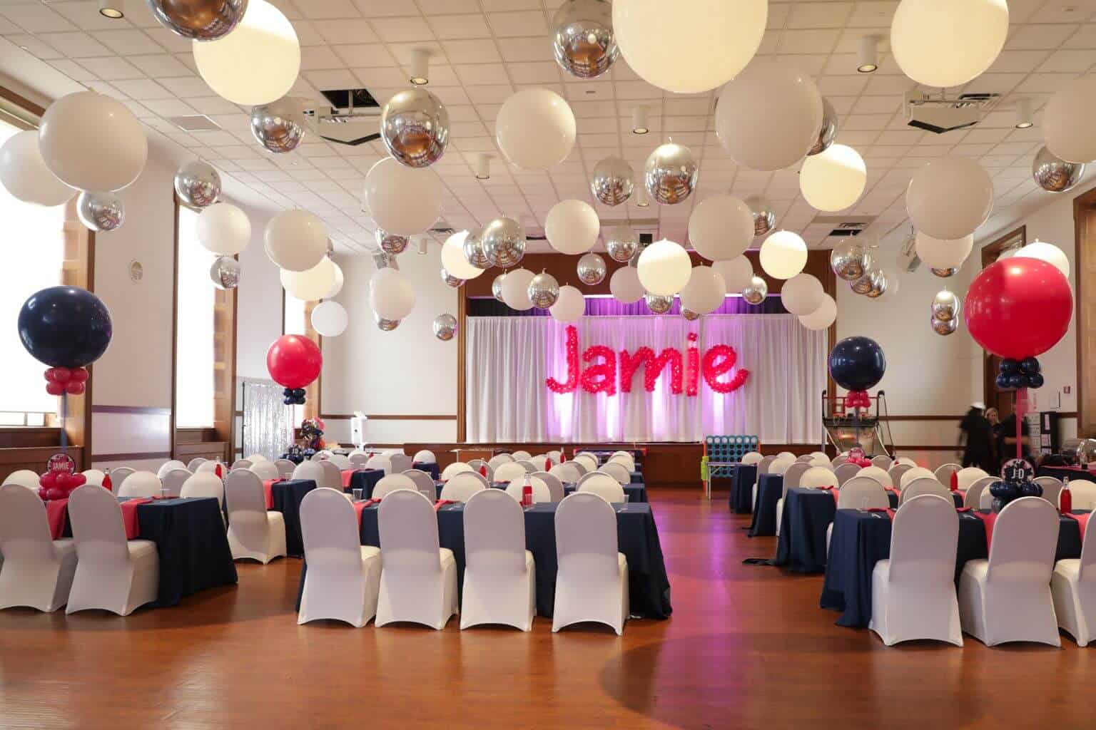 Hot Pink Sculpture Name in Balloons on LED Curtain at Temple Israel Center, White Plains