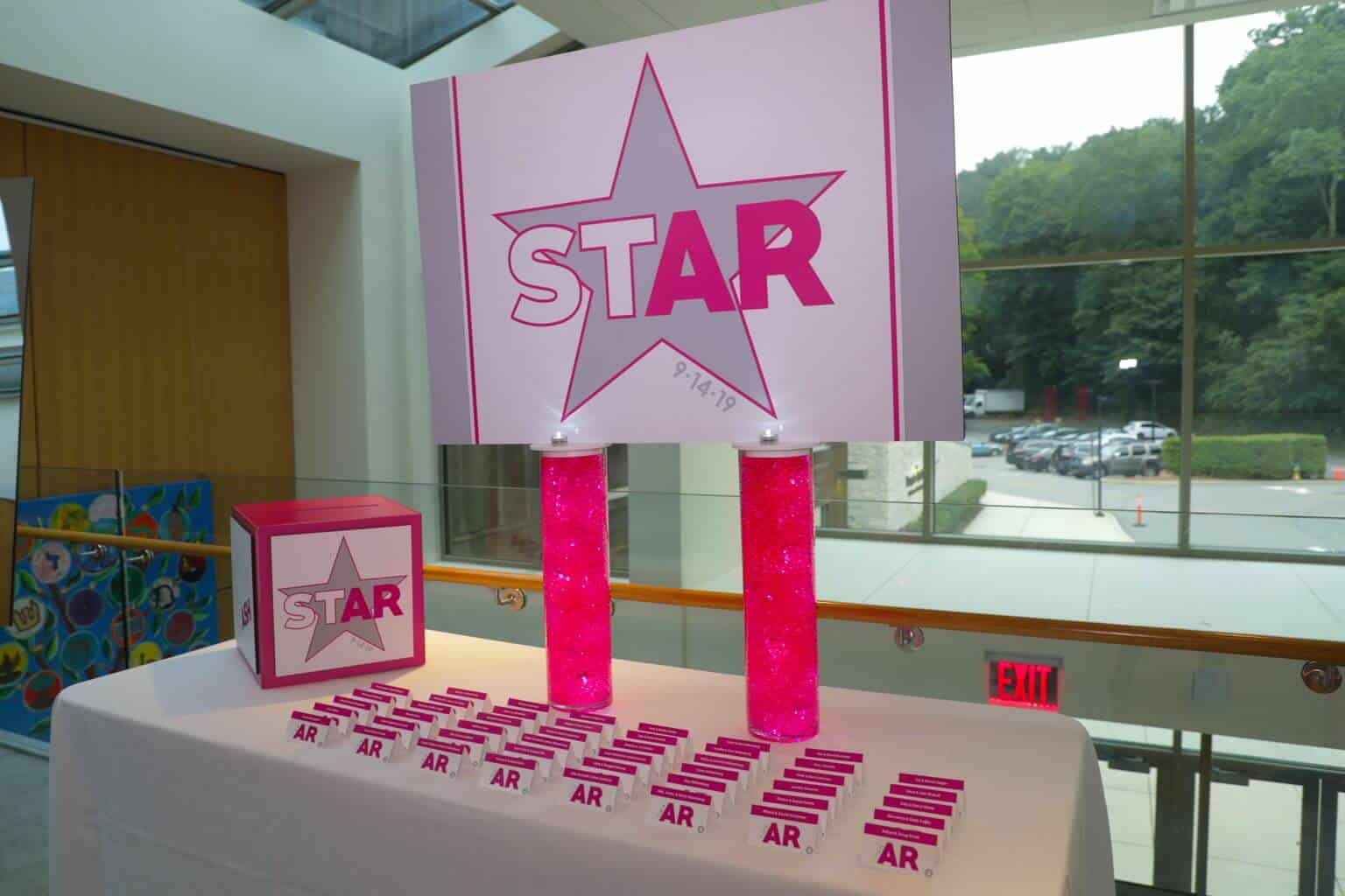 Logo Seating Card Display on LED Cylinders with Gems