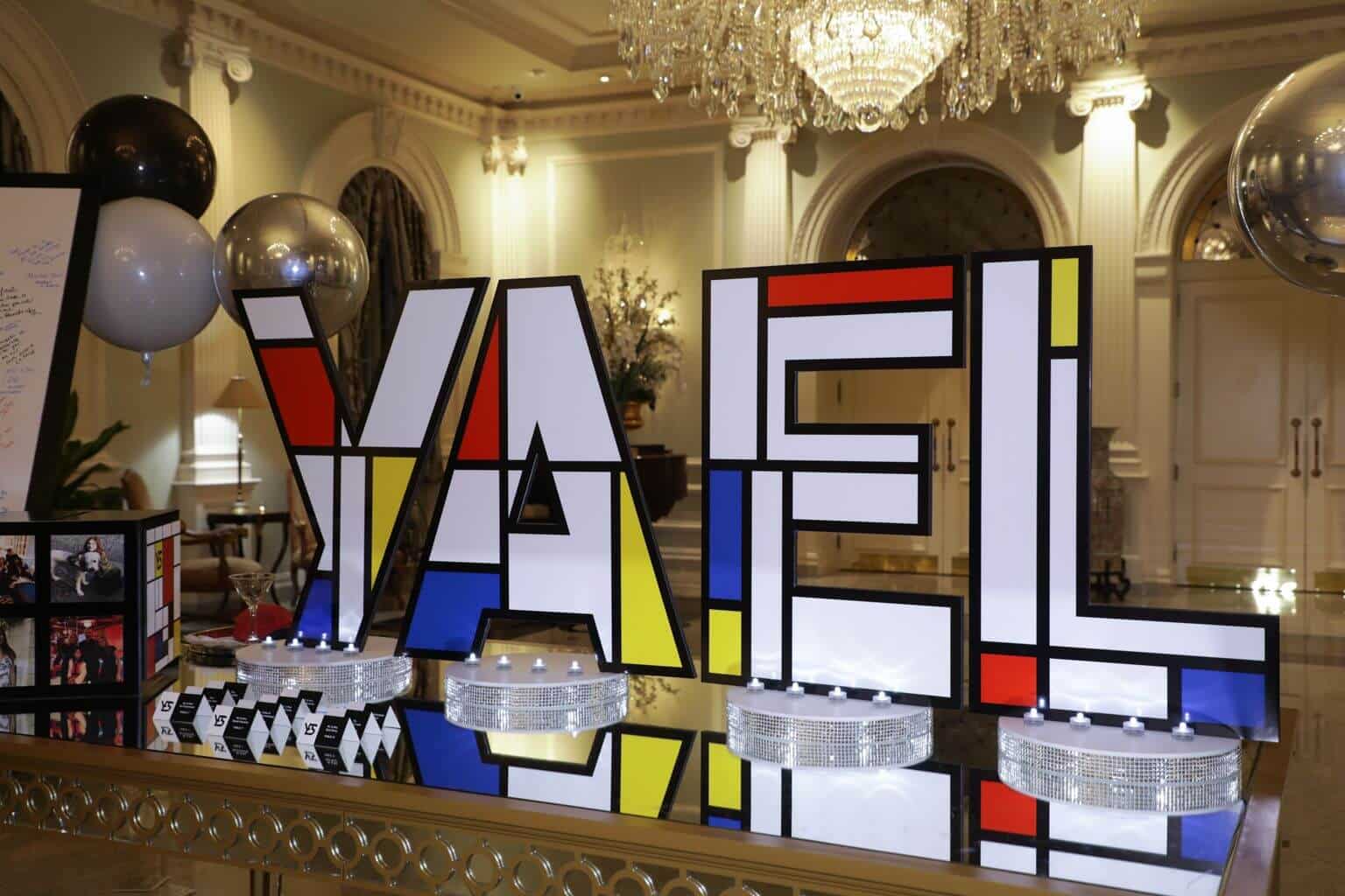 Cutout Name Seating Card Display for Mondrian Themed Bat Mitzvah