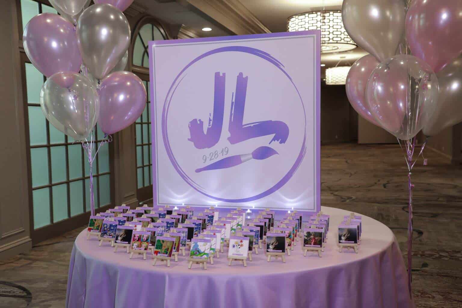 Art Themed Seating Card Display with Custom Logo