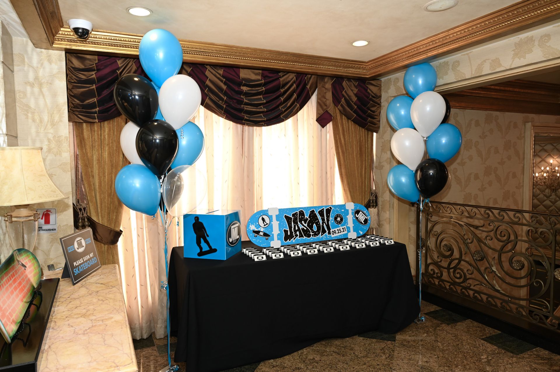 Custom Skateboard Theme Place Card Setup with Custom Skateboard Display, Gift Box and Balloon Trees