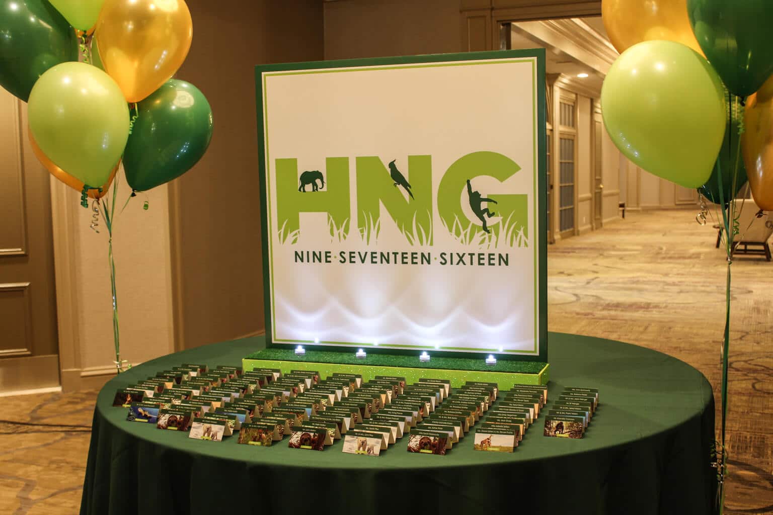 Animal Themed Seating Card Display with Custom Logo and Themed Place Cards