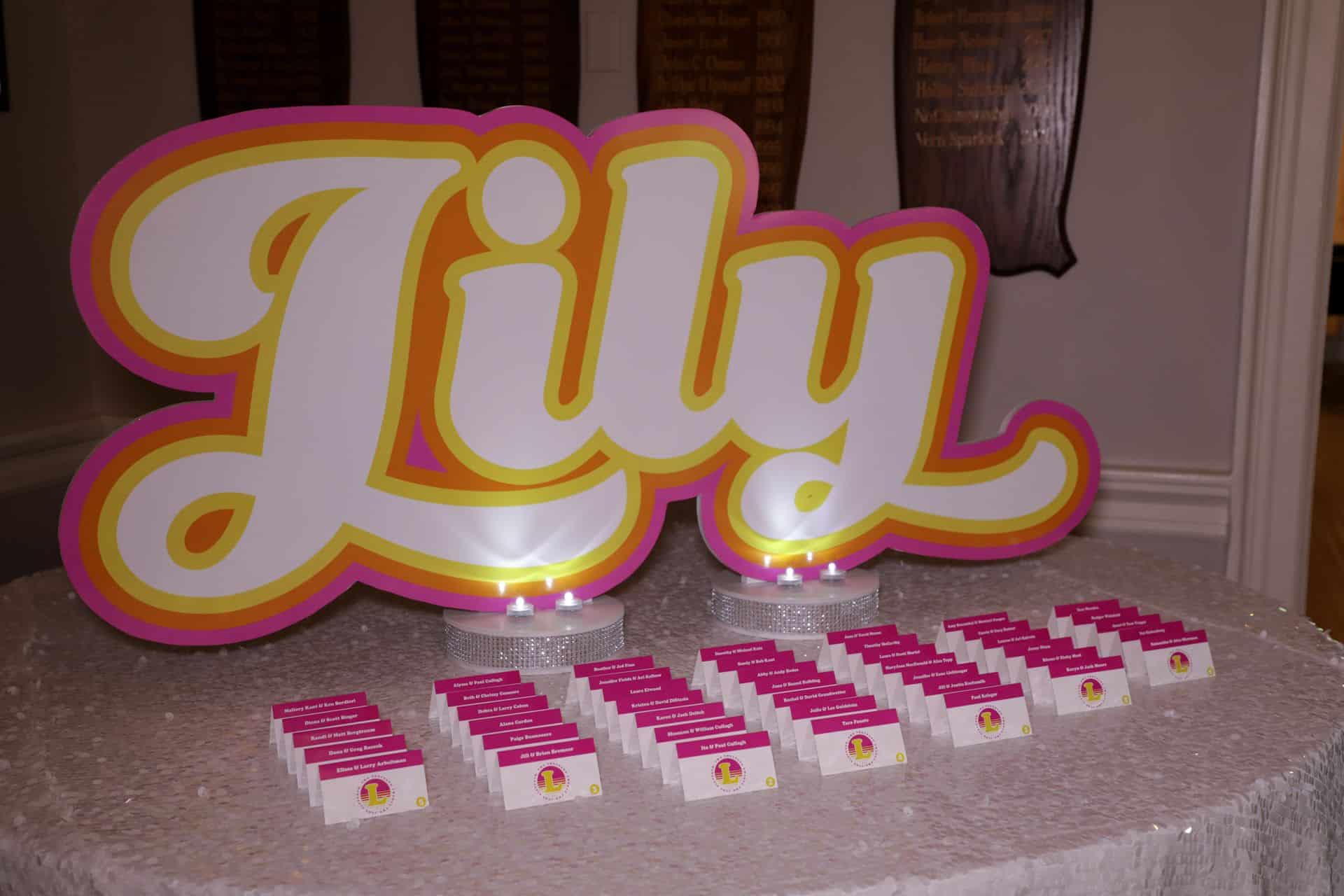 Cutout Logo Seating Card Display for Neon Themed Bat Mitzvah