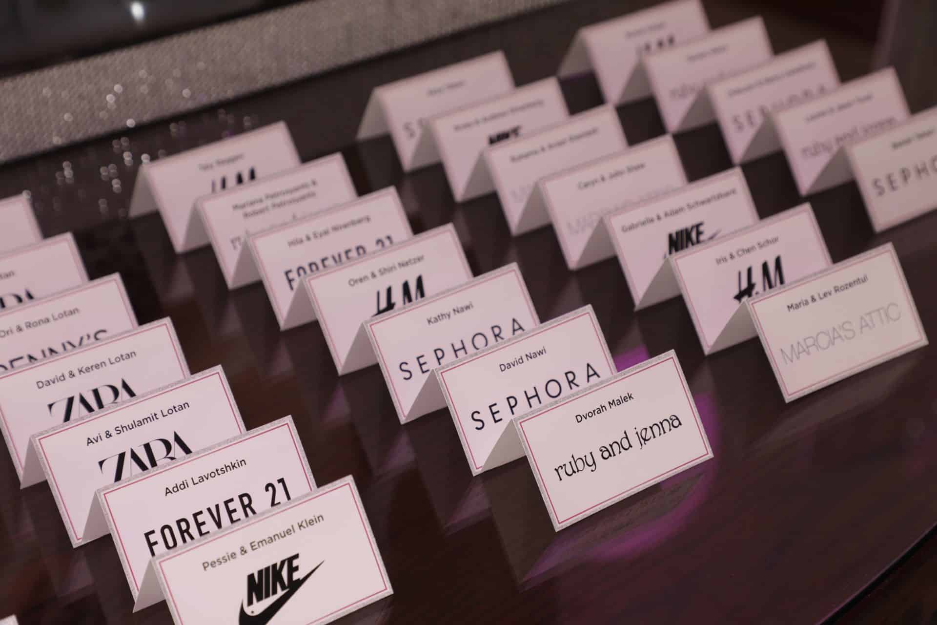 Fashion Themed Place Cards with Brand Logos for Shopping Themed Bat Mitzvah