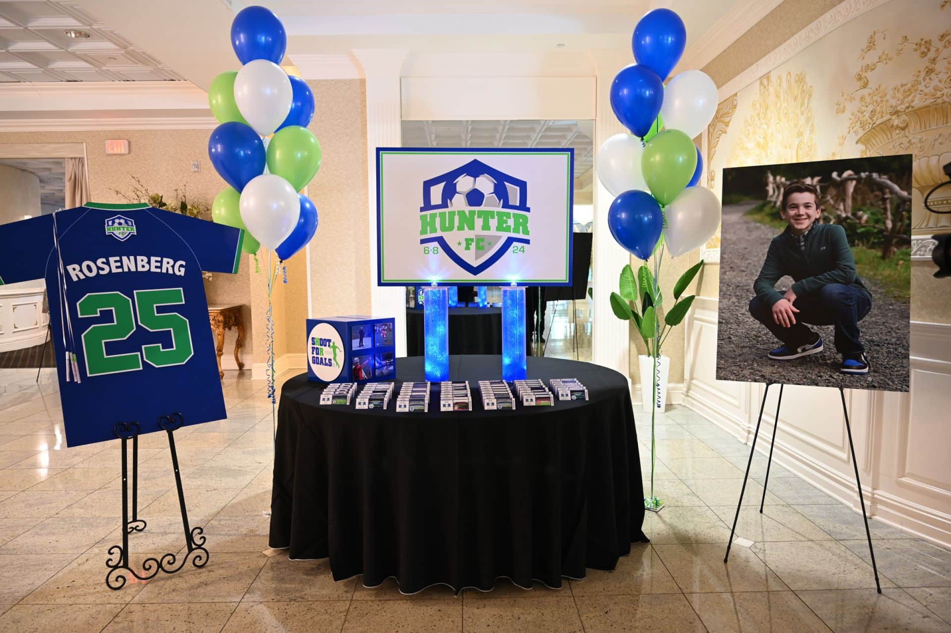 Soccer Themed Entrance Decor with Custom Jersey Sign in Board, Gift box, Ticket Place Cards and Logo Display at Wilshire Grand