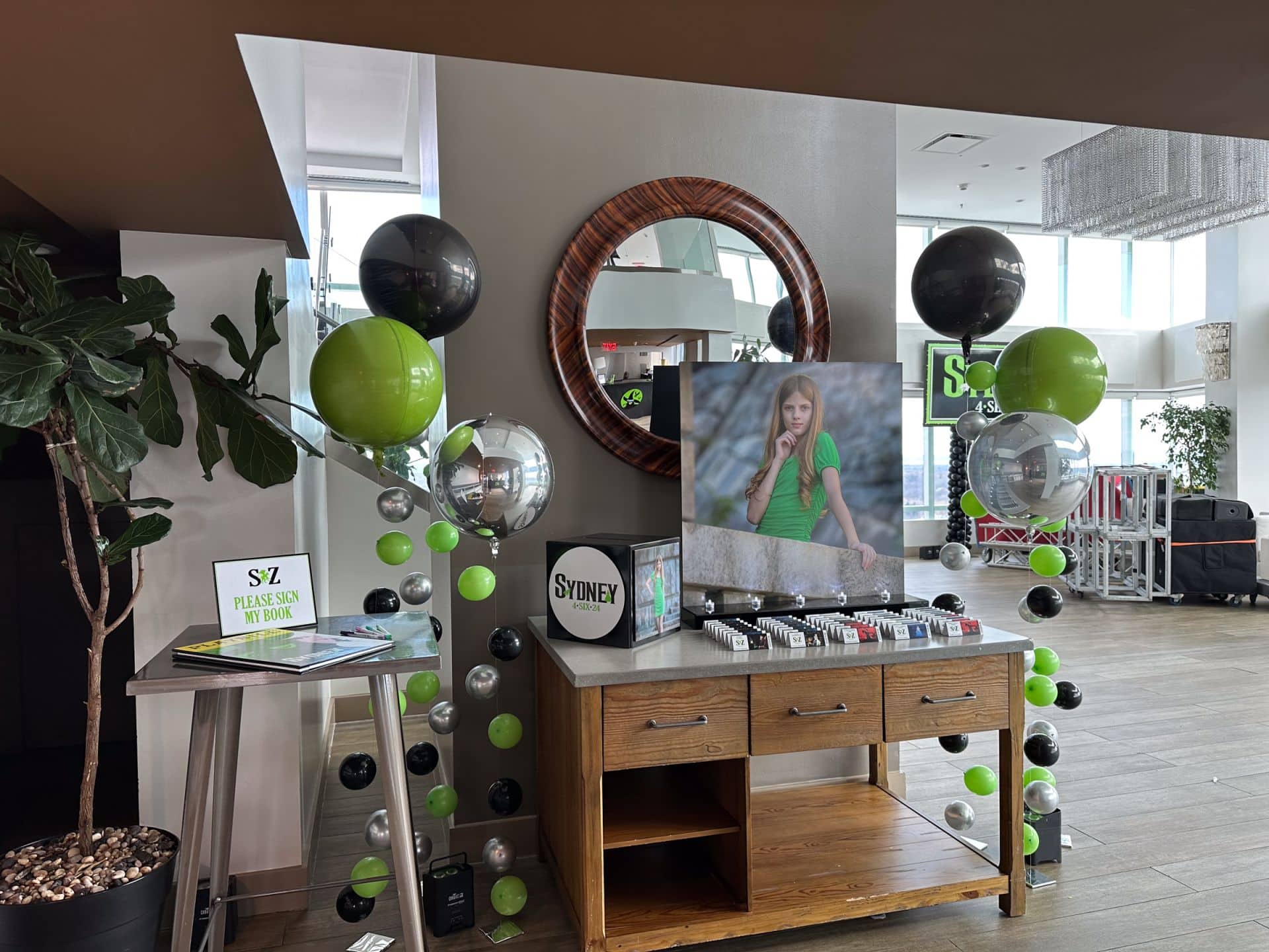 Wicked Entrance Decor with Custom Photo Display and Bubbles at Kanopi