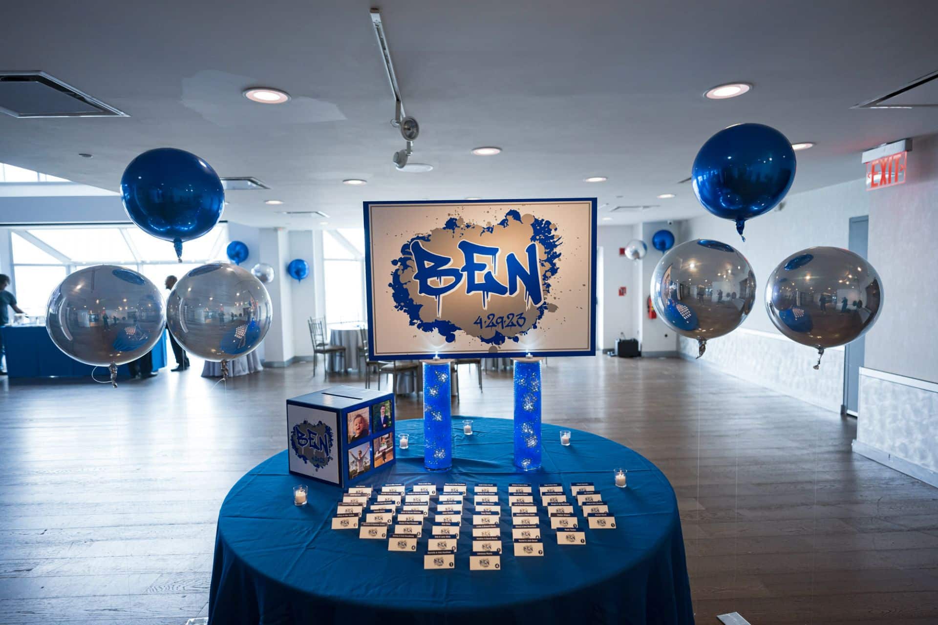 Bar Mitzvah Entrance Decor with Logo Display on LED vases, Custom Place Cards and Gift Box
