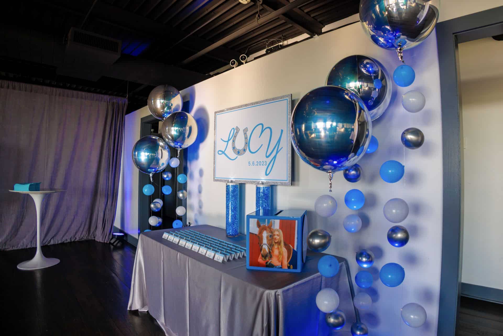 Seating Display Decor with Custom Logo Display on LED Vases, Custom Place Cards, Gift Box and Bubbles at Hudson Loft