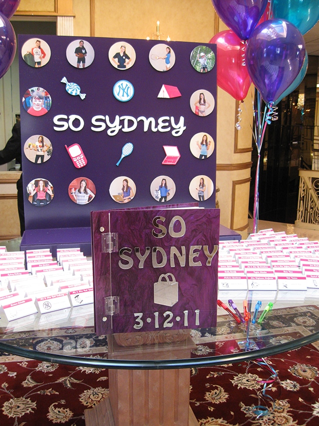 Purple Lucite Sign in book
