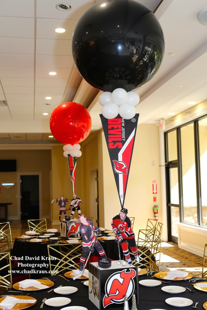 Hockey Themed Centerpiece with Cutout Player and Floating Pennants