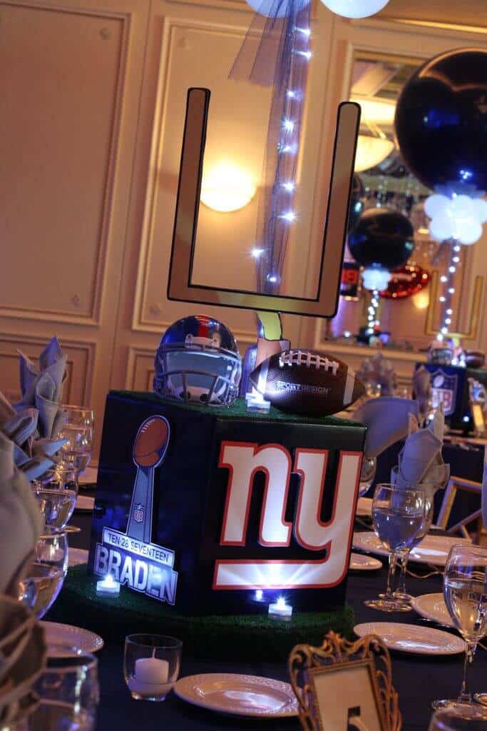 Football Themed Cube Centerpiece with Sports Equipment Toppers