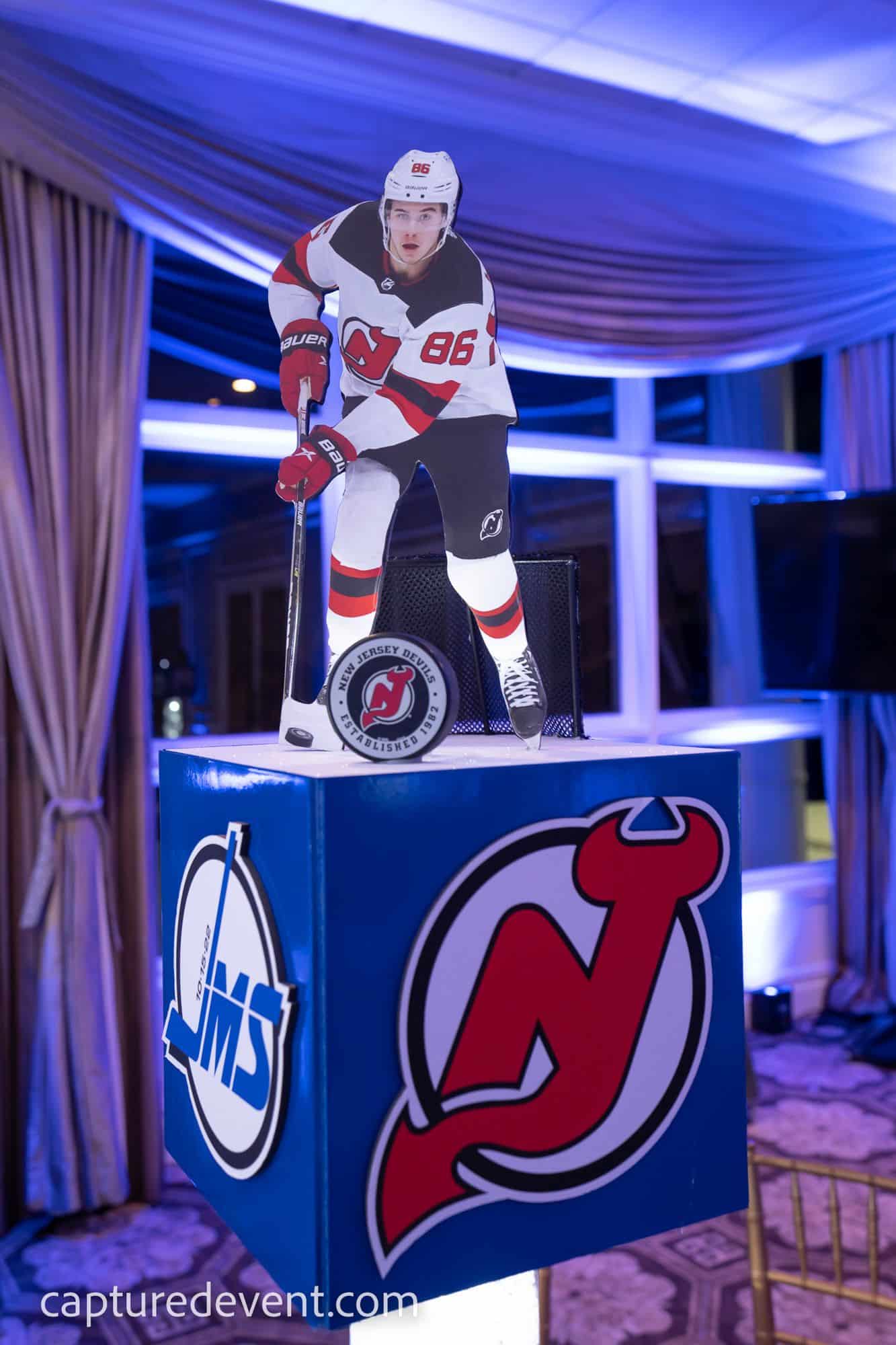Hockey Themed Centerpiece with Custom Logos and Player Cutouts