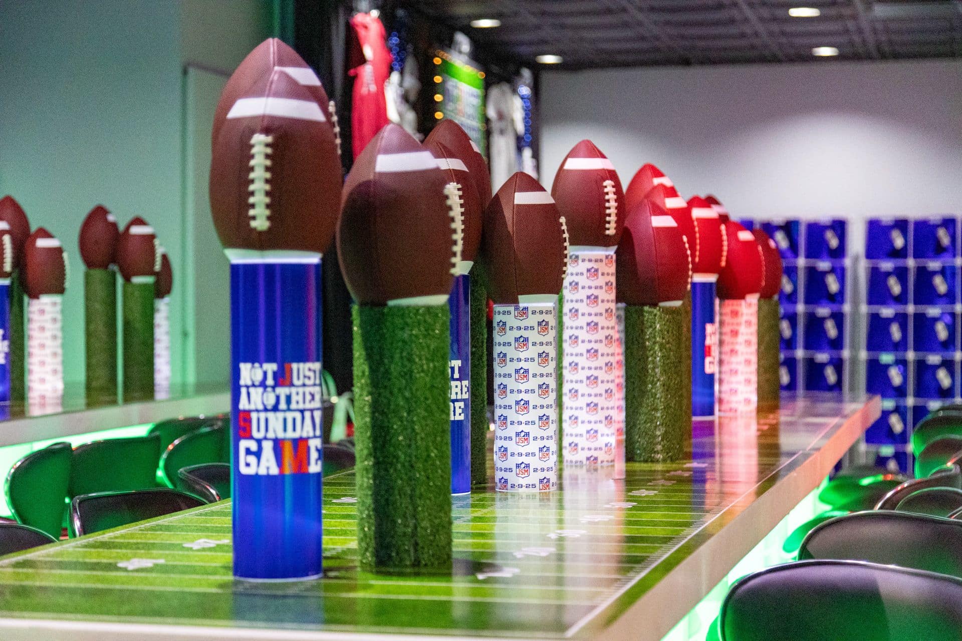 Footballs on Custom Logo Wrapped Cylinders for a Bar Mitzvah