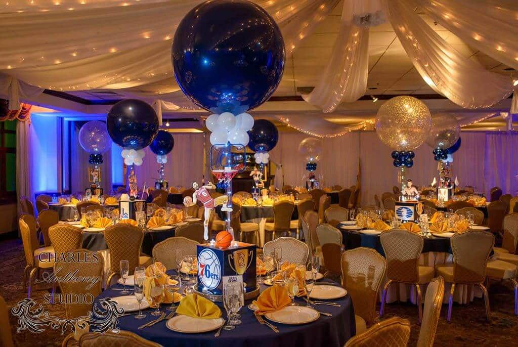 Basketball Themed Centerpieces with Logo, Player Cut Out, Basketball and Hoop