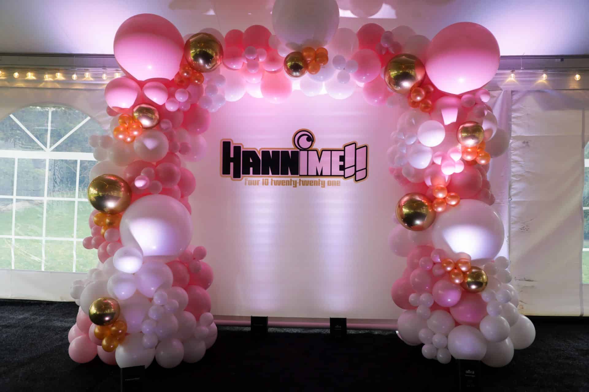 Custom Anime Themed Vinyl Backdrop with Logo and Beautiful Organic Balloon Arch
