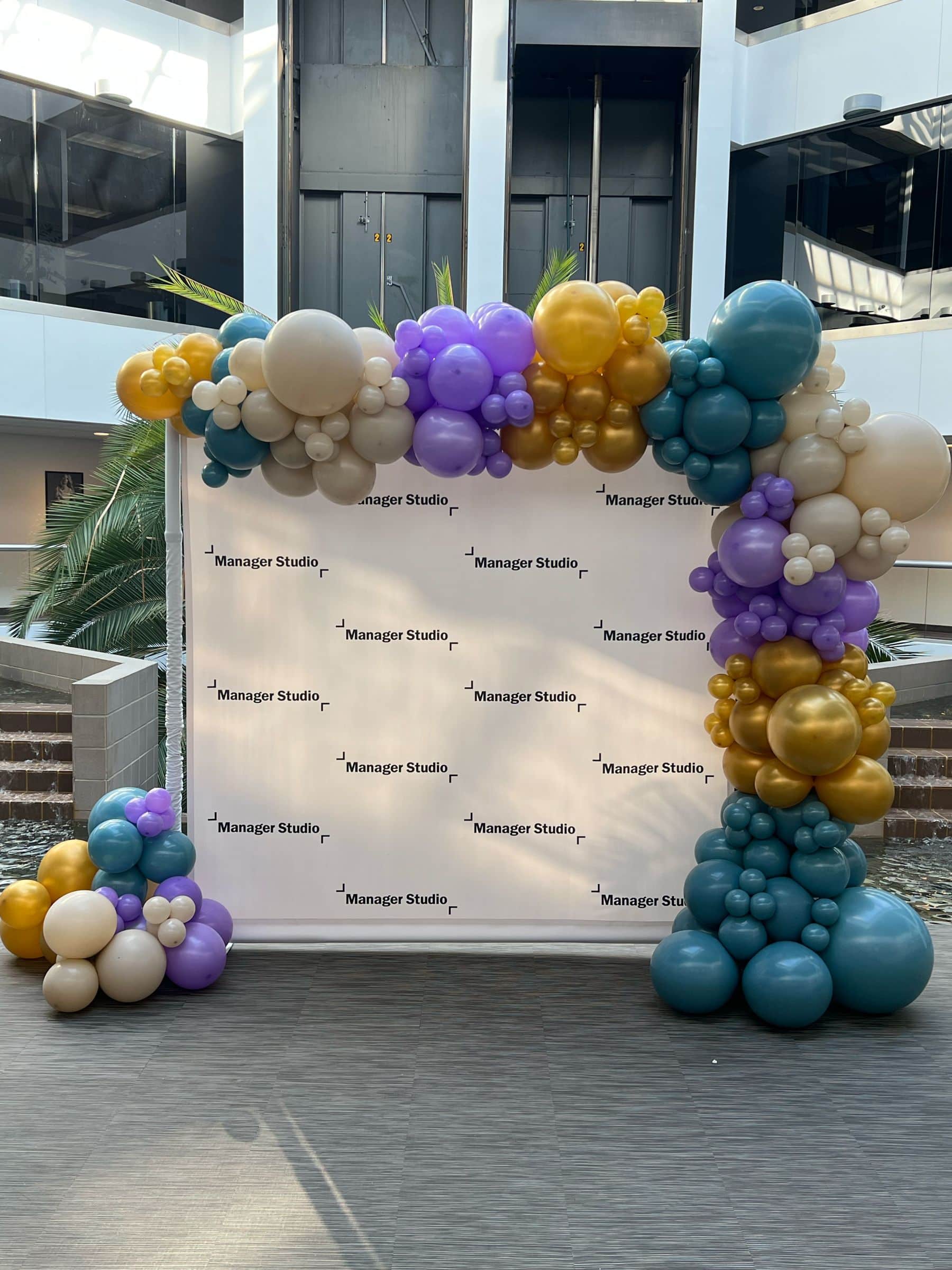 Custom Corporate Step and Repeat with Organic Balloon Garland
