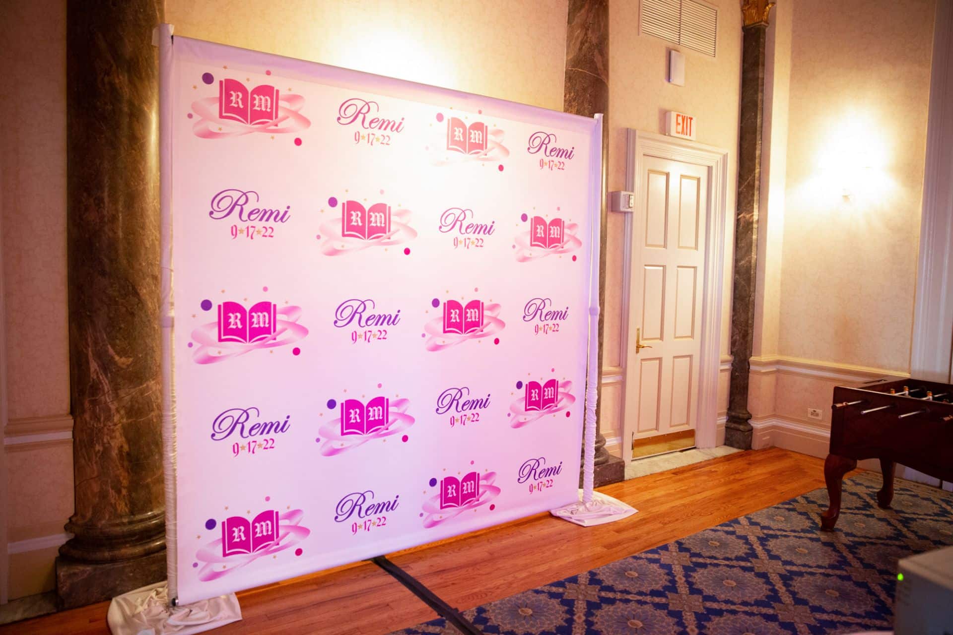 Book Themed Step and Repeat with Custom Logos for Bat Mitzvah Photo Booth