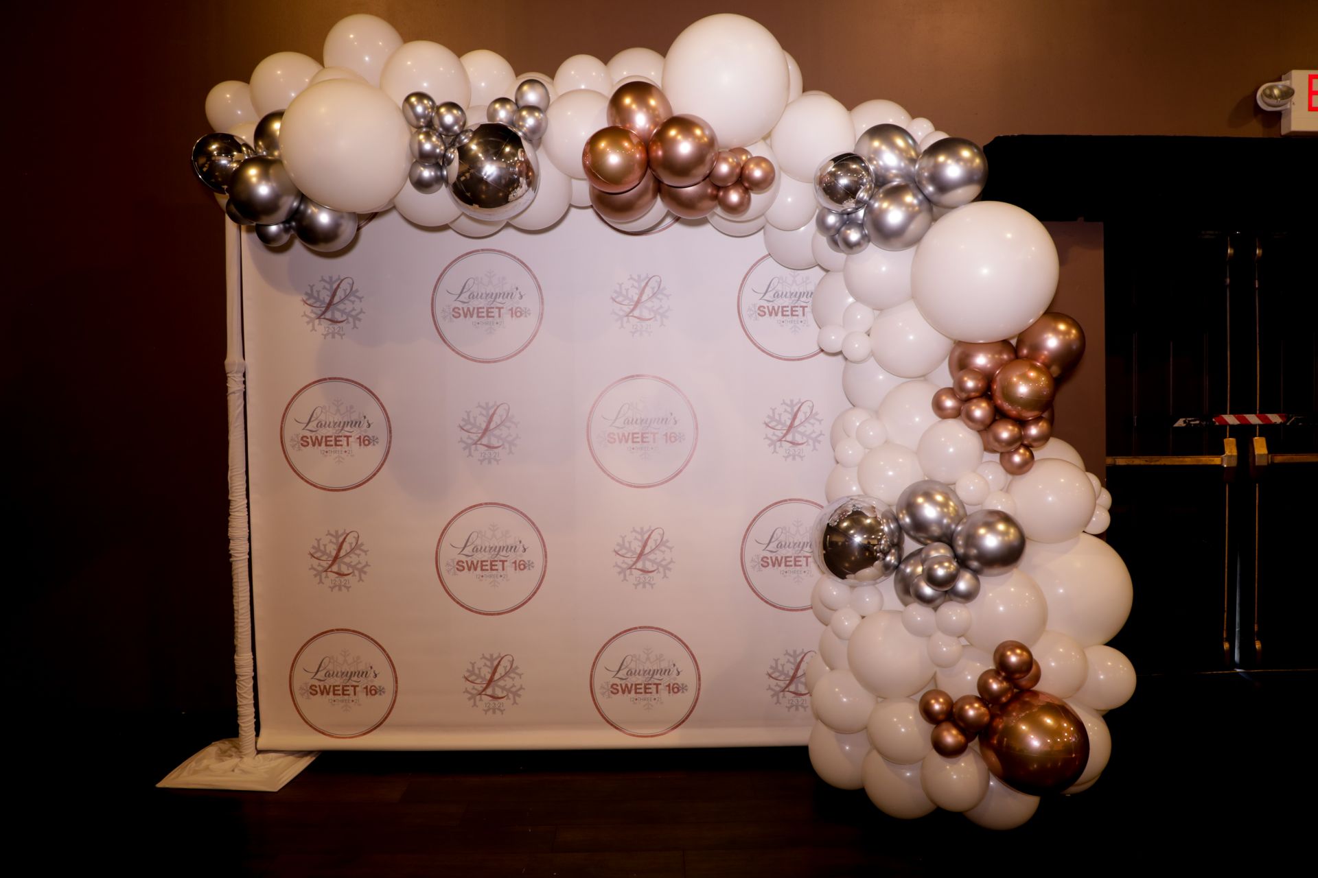 Beautiful Custom Step and Repeat with Organic Half Balloon Arch as Photo Op for Sweet Sixteen