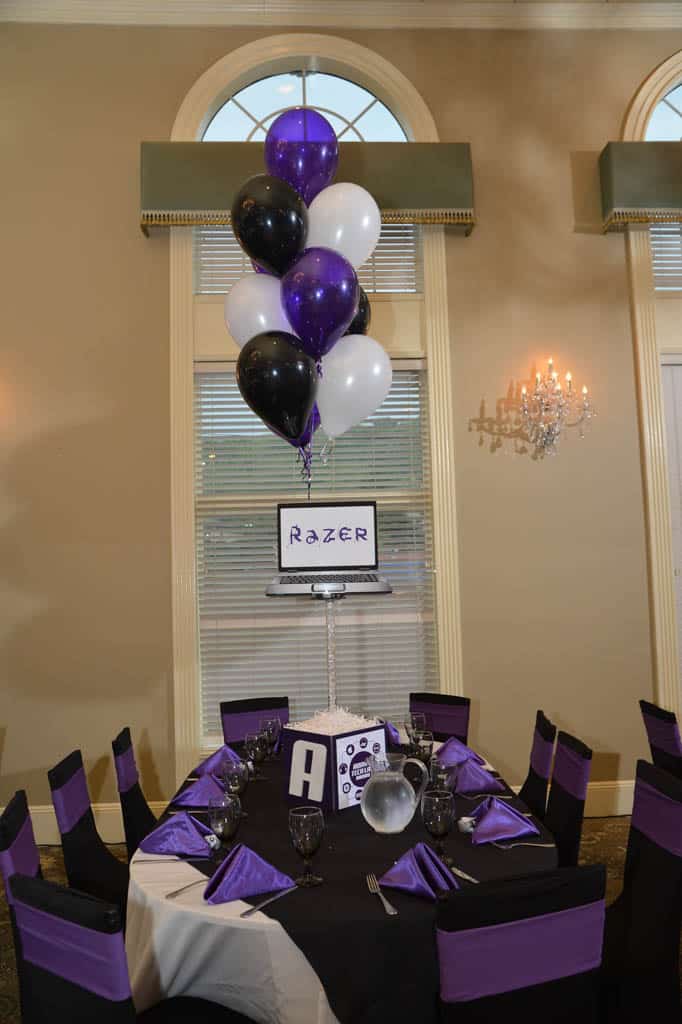 Technology Themed Centerpiece with Blowup Computer Images and Logos