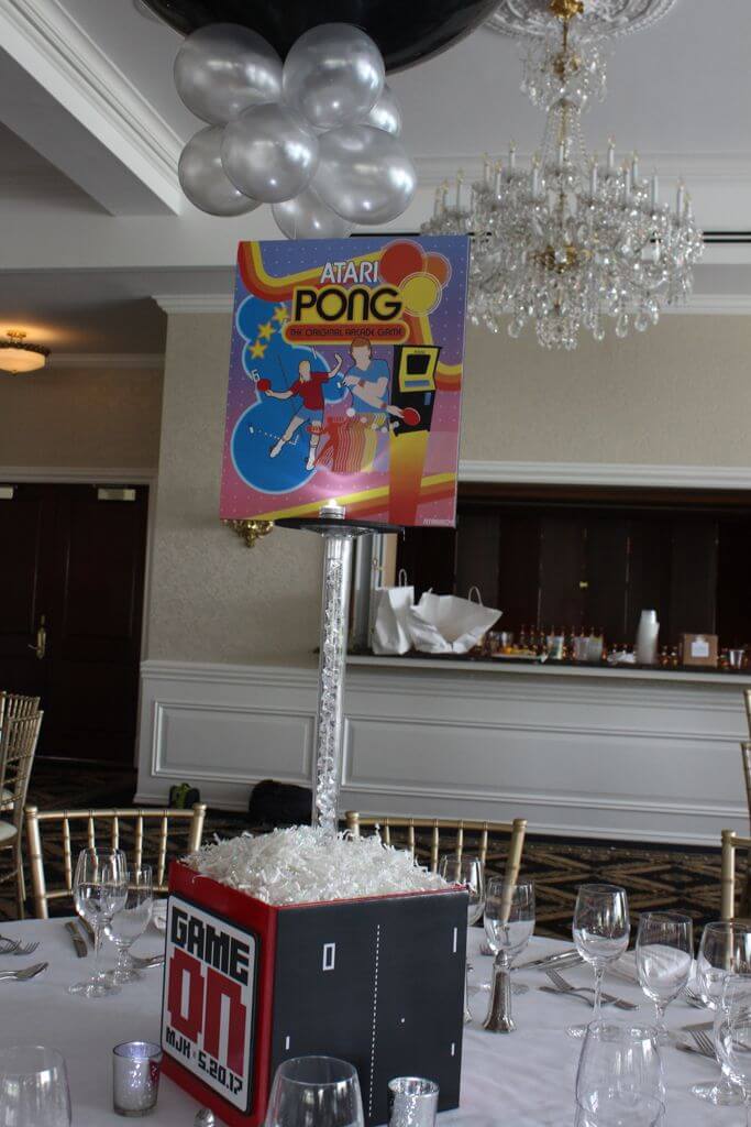 Video Game Themed Centerpiece with Photo Cube Base and Blowup Game Cover