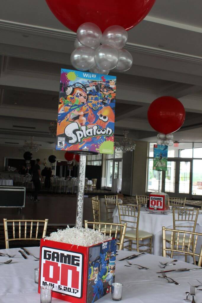 Video Game Themed Centerpiece with Photo Cube Base and Blowup Game Cover