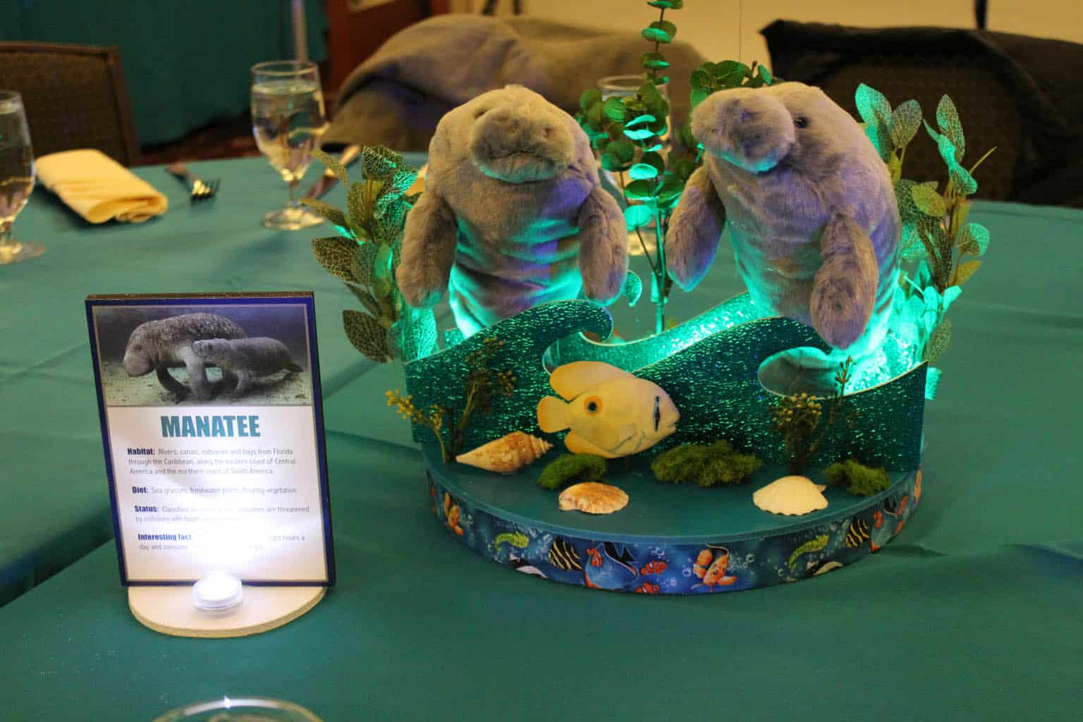 Underwater Themed Centerpiece with Plush Manatees and Custom Table Signs