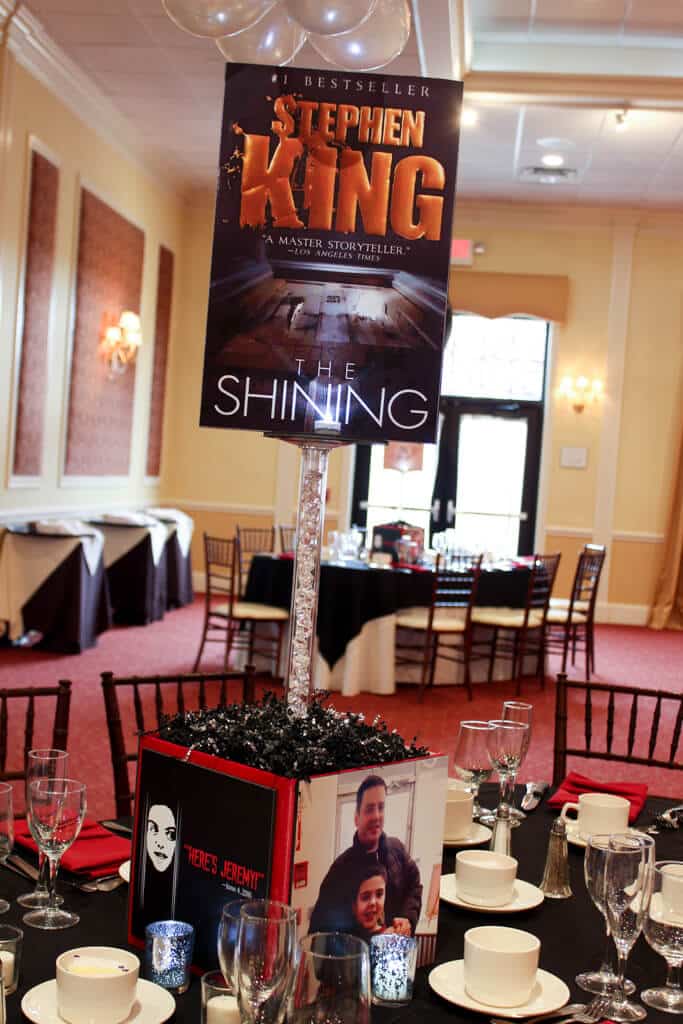 Horror Book Themed Bar Mitzvah Centerpiece with Book Covers and Custom Logo