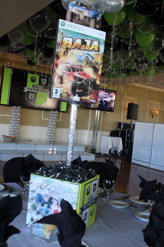 Video Game Themed Centerpiece with Photo Cube Base and Blowup Game Cover