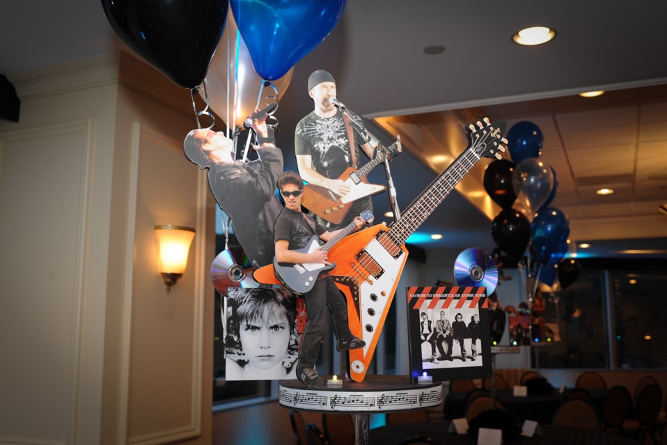 Music Themed Centerpiece with Cutout Music Artists, Guitar and Album Covers