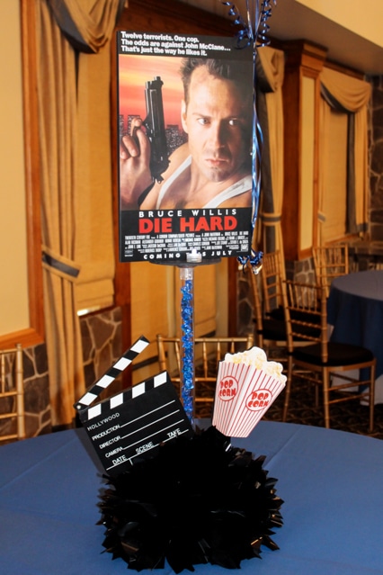 Movie Cover Centerpiece with Pop-Out Clapboard and Popcorn
