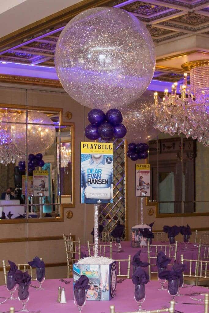 Broadway Themed Centerpiece with Blowup Playbill and Purple and Silver Sparkle Balloon