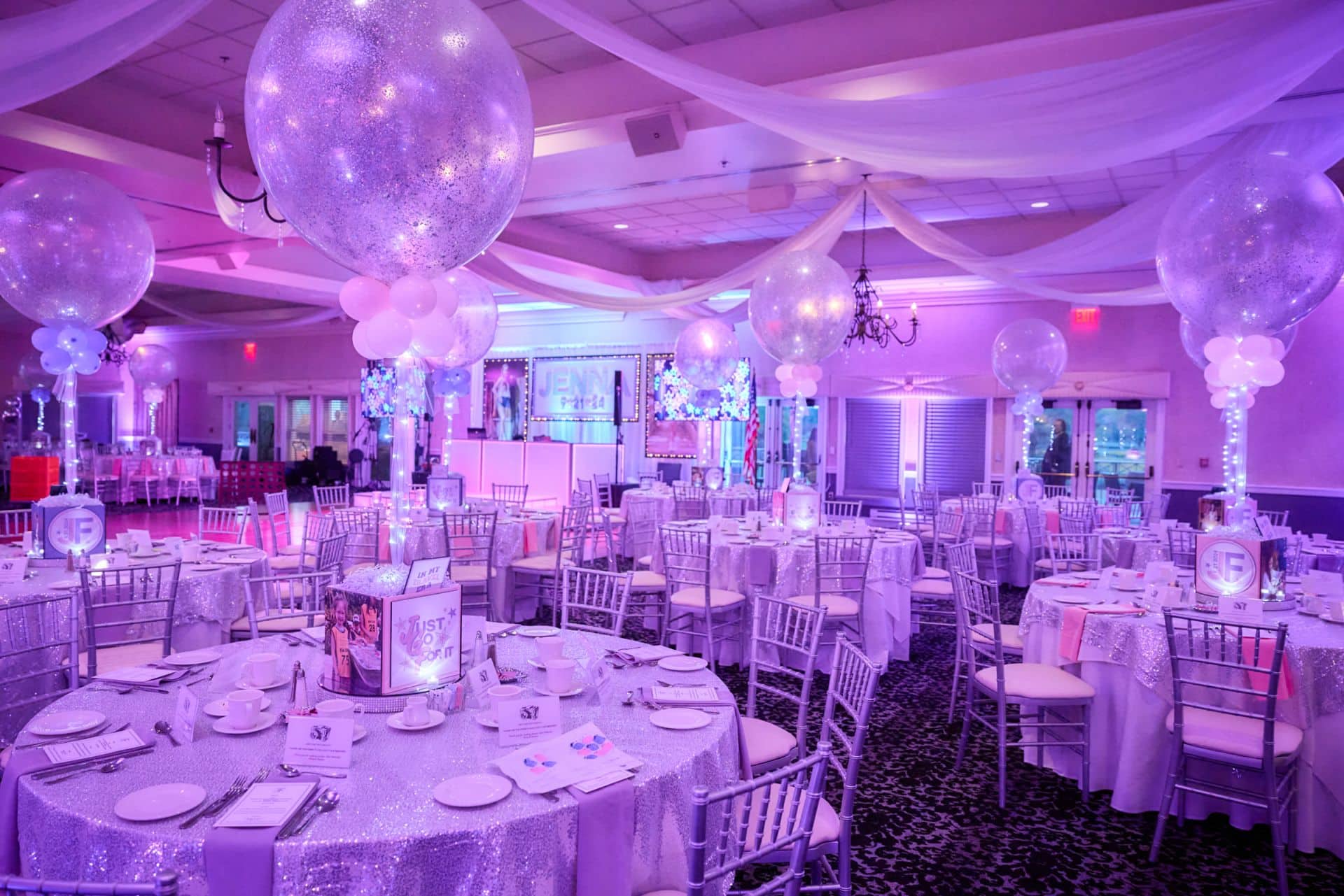 Pink and Lavender Uplighting for a Bat Mitzvah at Indian Springs Country Club