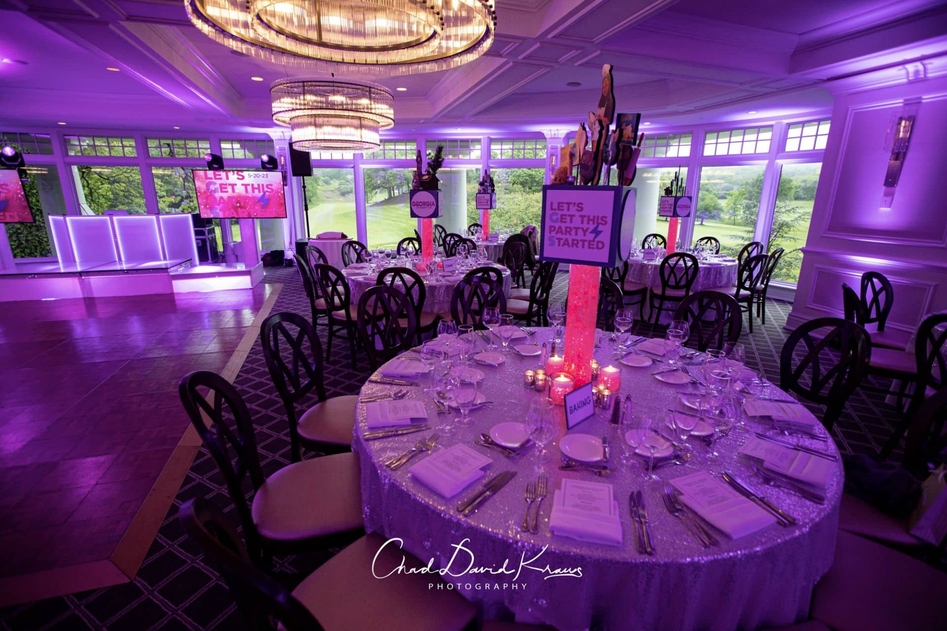 Purple LED Uplighting With Themed Centerpieces for Bat Mitzvah Party at Scarsdale Golf Club